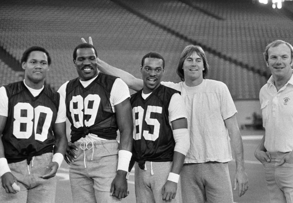 San Francisco 49ers wide receiver Dwight Clark, second from right, has a bit of fun with...
