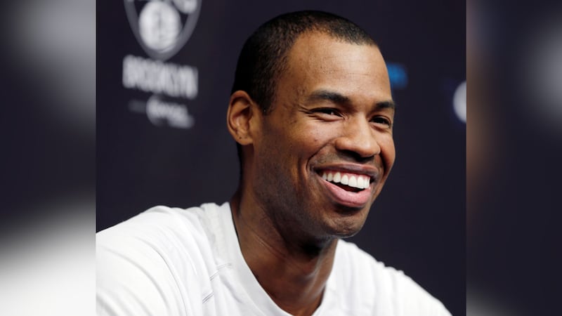 FILE -- Brooklyn Nets Jason Collins speaks during a news conference before an NBA basketball...