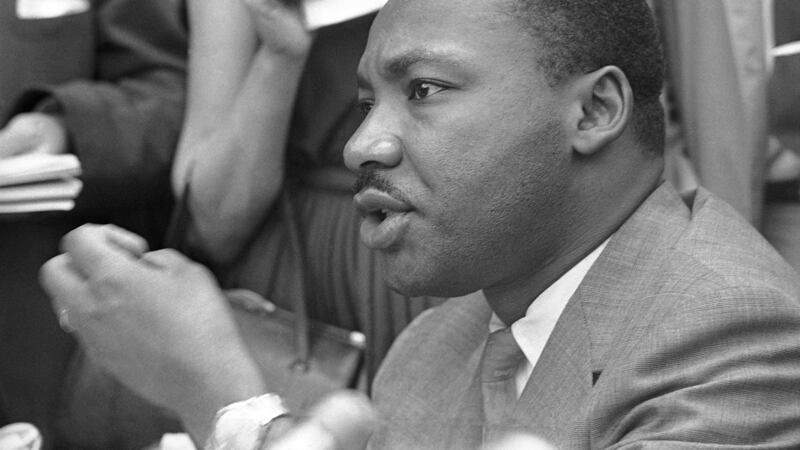 FILE - Rev. Martin Luther King Jr., speaks to reporters in Birmingham, Ala., May 9, 1963. (AP...