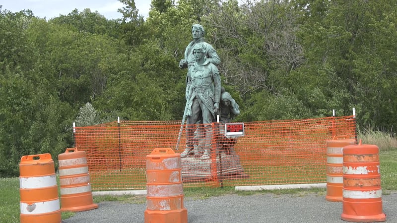 The statue of Sacajawea, Lewis and Clark stands -- off its pedestal -- at Darden Towe Park.