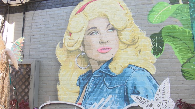 A mural of Dolly Parton now covers the side of a home in Richmond's Oregon Hill neighborhood,...