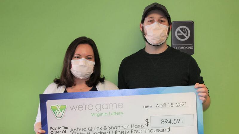 Shannon Harris and Josh Quick with their lottery check.